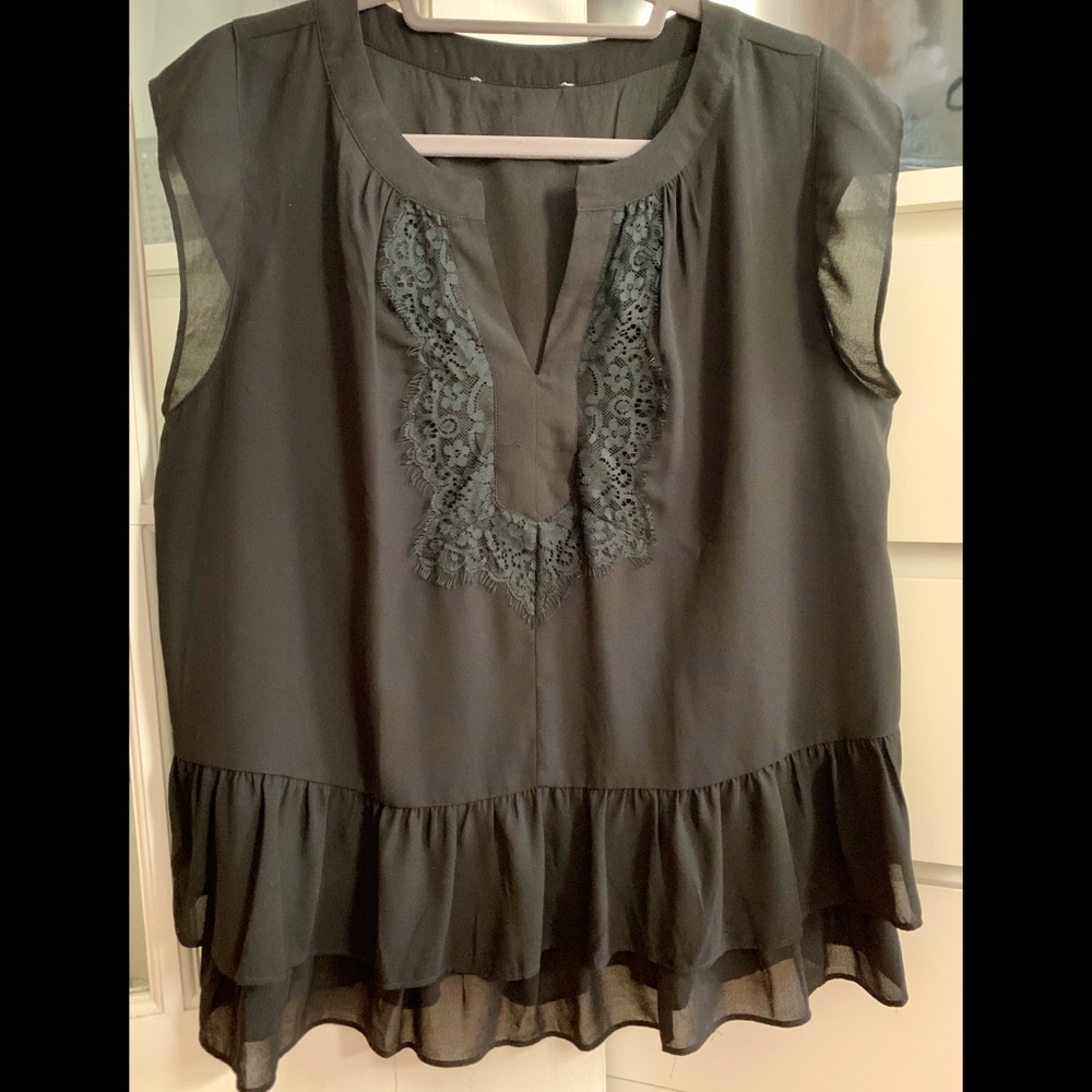 Loft blouse with a peplum bodice.